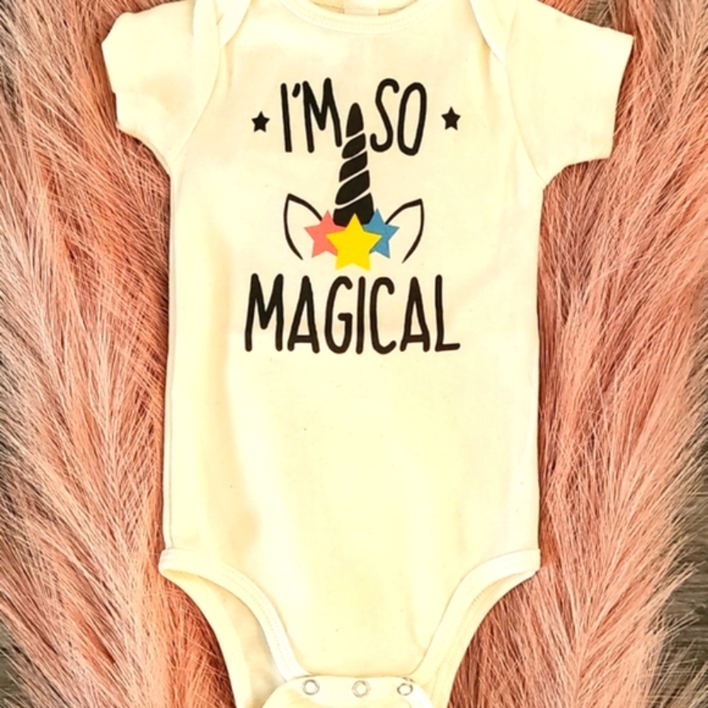 Royalapparel 100% organic cotton, made in USA. Baby girl short sleeve onesie.